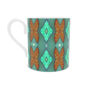 Soft Geometry Mug in Aqua and Coral by Mindy Macgregor